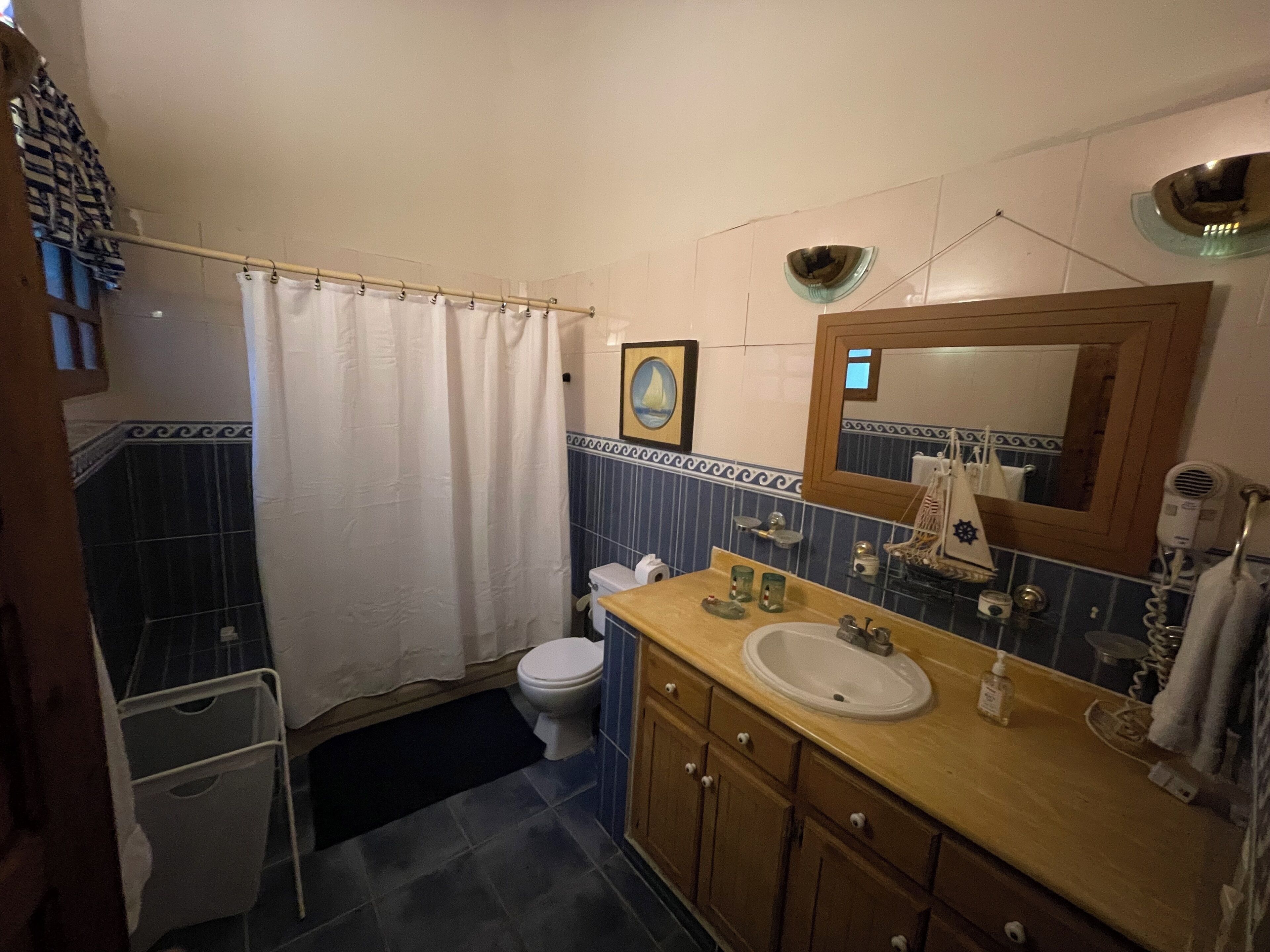 Hair dryer, towels, soap, toilet paper