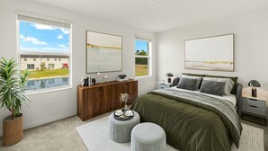 A modern bedroom with a large bed, two windows, a wooden dresser, and a view of a building and water outside. - 2025 Newly Constructed 3-Bedroom Townhome in Lovely North Fort Myers. (North Fort Myers)
