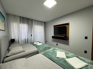 3 habitaciones, tabla de planchar con plancha, wifi y ropa de cama 