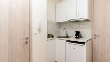 Fridge, microwave, coffee/tea maker, toaster