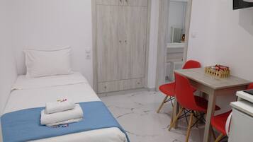 2 dormitorios, tabla de planchar con plancha, wifi gratis y ropa de cama