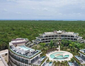 Unclassified image, 4 of 57, button - 2 Story Loft, Pool Access, King Bed, Gym and 7 Pools (Tulum)