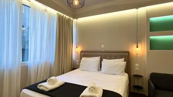 1 habitación, tabla de planchar con plancha, wifi gratis y ropa de cama