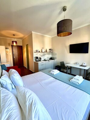 1 habitación, tabla de planchar con plancha, wifi gratis y ropa de cama 