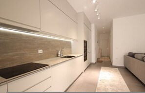 Private kitchen - SanPietro Vacation Apartment 020 (Plazhi San Pietro)