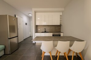 Private kitchen - SanPietro Vacation Apartment 030 (Plazhi San Pietro)