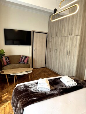 1 chambre, bureau, fer et planche à repasser, Wi-Fi gratuit