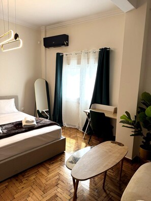 1 chambre, bureau, fer et planche à repasser, Wi-Fi gratuit