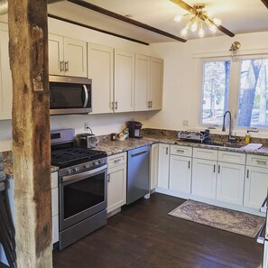Design Apartment, Patio, Garden View | Microwave - Historic Horse Barn Apartment in Goshen (Goshen)