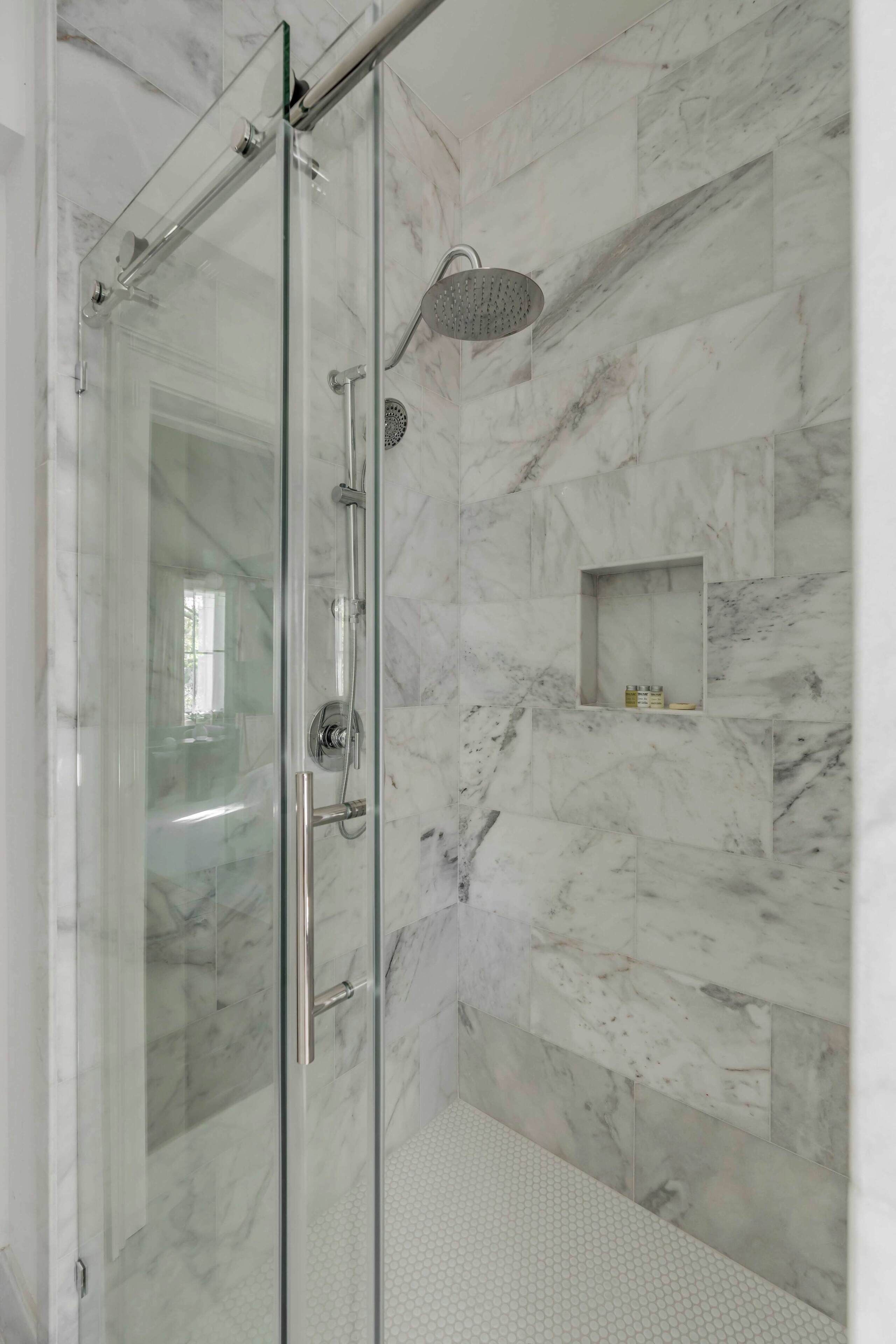 Shower, hair dryer, towels, shampoo