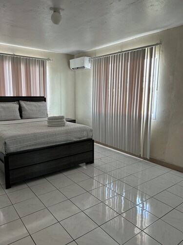 Cozy 2-bedroom apartment in serene Mangilao with AC