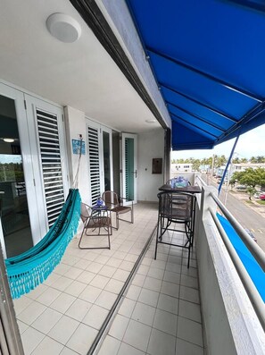 Outdoor dining - Blue Villa @Playa Azul Beach is a charming 1BR/1BA apartment in Luquillo. (Luquillo)
