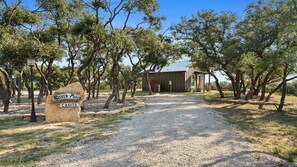 A gravel path leading to a building with a sign reading "Silver Moon Casita." - Big Groups - Big Memories-Whole Ranch in Graham-34 (Graham)