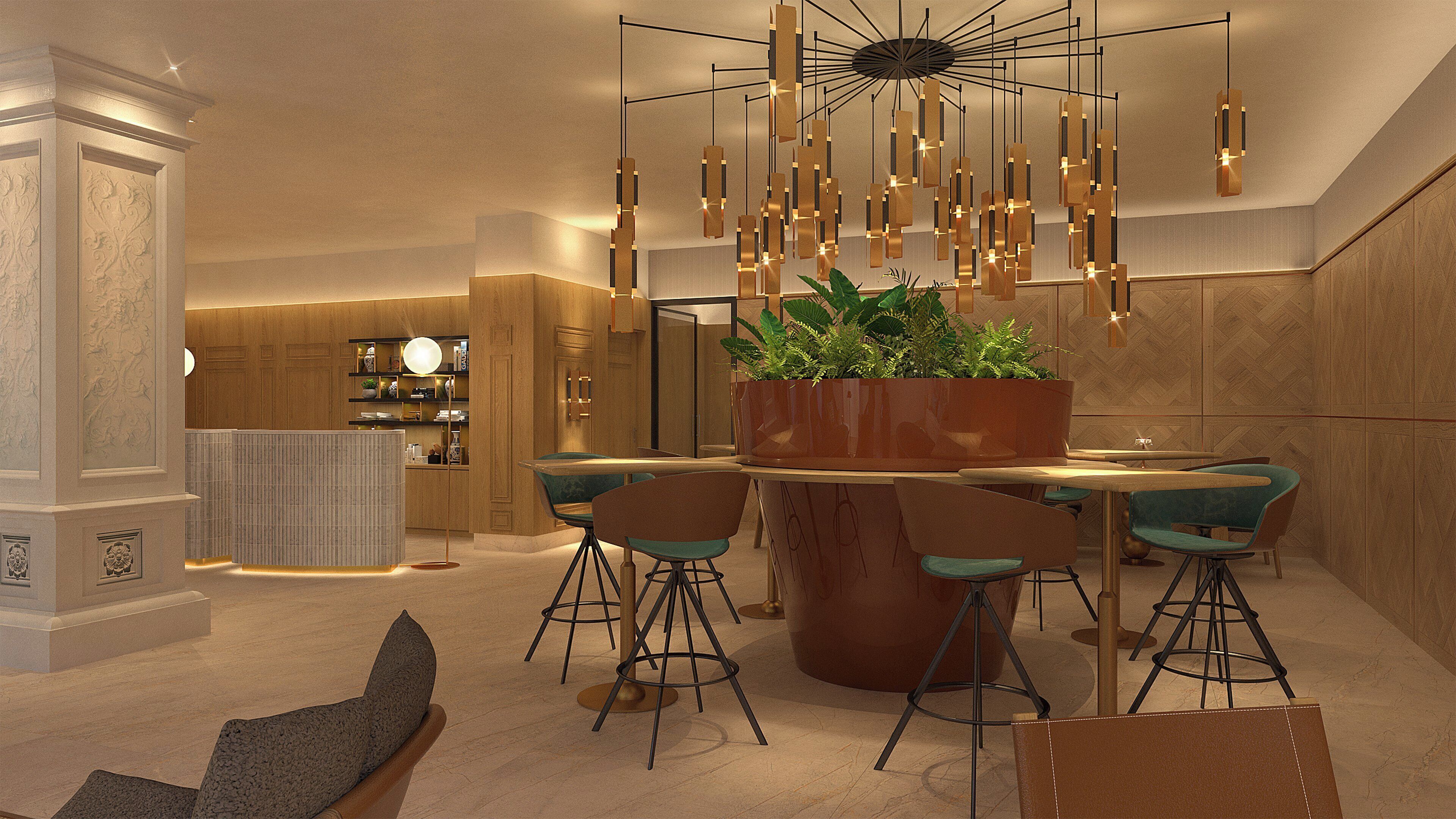 Un comedor moderno con una mesa central, taburetes de bar y una lámpara colgante.