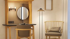 A room with a wooden desk, a round mirror, a floor lamp, and a cushioned chair. - Casa Del Compositor, Vignette Collection by IHG (Jerez de la Frontera)
