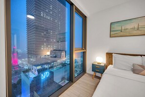 Appartement Familial, balcon, vue ville | Bureau, rideaux occultants, fer et planche à repasser, Wi-Fi gratuit