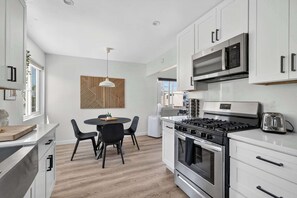 Fridge, microwave, oven, stovetop - The Obcation 1 | Easy, Breezy Ocean Living (San Diego)