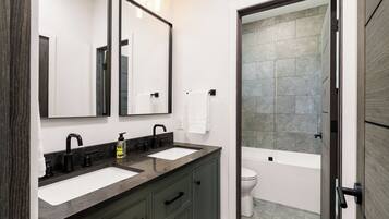 Hair dryer, towels, soap, shampoo