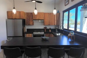 Fridge, stovetop, coffee/tea maker, cookware/dishes/utensils