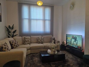 Departamento, 1 habitación, chimenea | Sala de estar