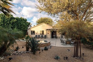 A house with a patio, outdoor seating, and a small pool. - Blue Jay by Nest Villas | Idyllic Pool & Spa (Indio)
