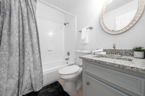 Hair dryer, towels, soap, shampoo