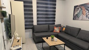 Leilighet – deluxe, balkong, byutsikt | Oppholdsområde