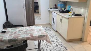 Appartement Deluxe, balcon, vue ville | Cuisine privée