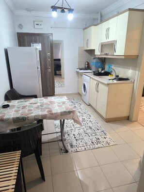 Appartement Deluxe, balcon, vue ville | Cuisine privée