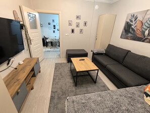 Appartement Deluxe, balcon, vue ville | Coin séjour