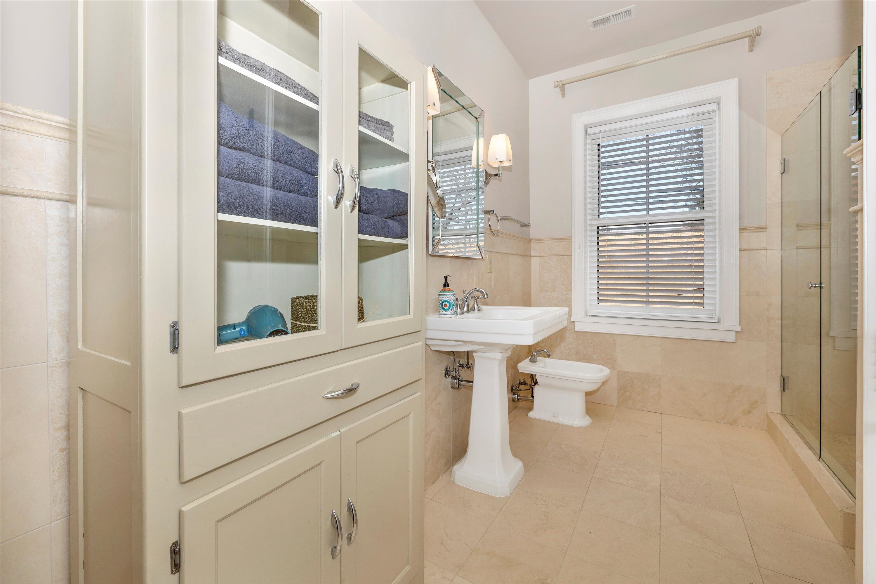 Shower, hair dryer, towels, soap