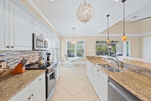 Fridge, microwave, oven, stovetop - Bonita Breeze | Prime Location | Screened Pool & Spa (Bonita Springs)