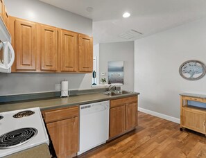 Private kitchen - Ludington STRAM - Unit 202, a cozy 2-bedroom retreat (Ludington)