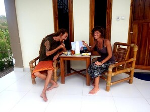 Comfort trippelrum - icke-rökare - utsikt mot trädgården | Restaurang utomhus