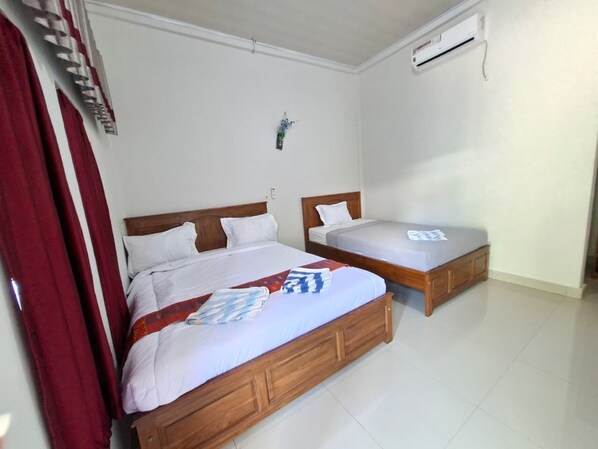 Classic Triple Room, Non Smoking, Garden View | Free WiFi - Golo Tango Homestay (Labuan Bajo)