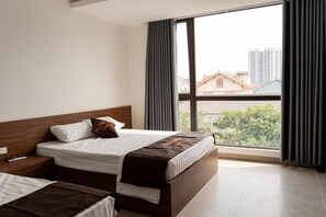 In-room safe, desk, laptop workspace, soundproofing - Linh Anh Motel (Thanh Hóa)