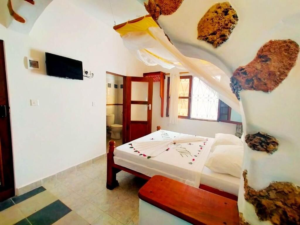 Suite estudio Deluxe, vista al jardín | Decoración personalizada, muebles diferentes y wifi gratis 