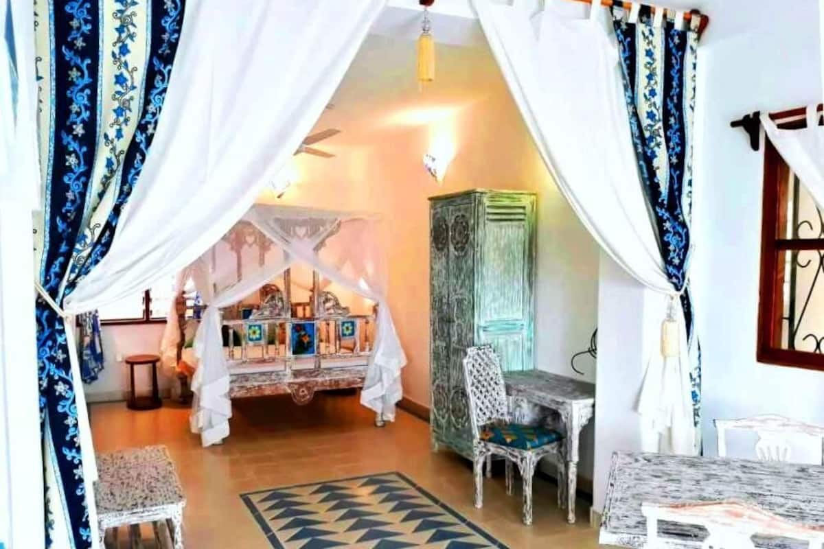 Deluxe Studio Suite, Garden View | Individually decorated, individually furnished, free WiFi