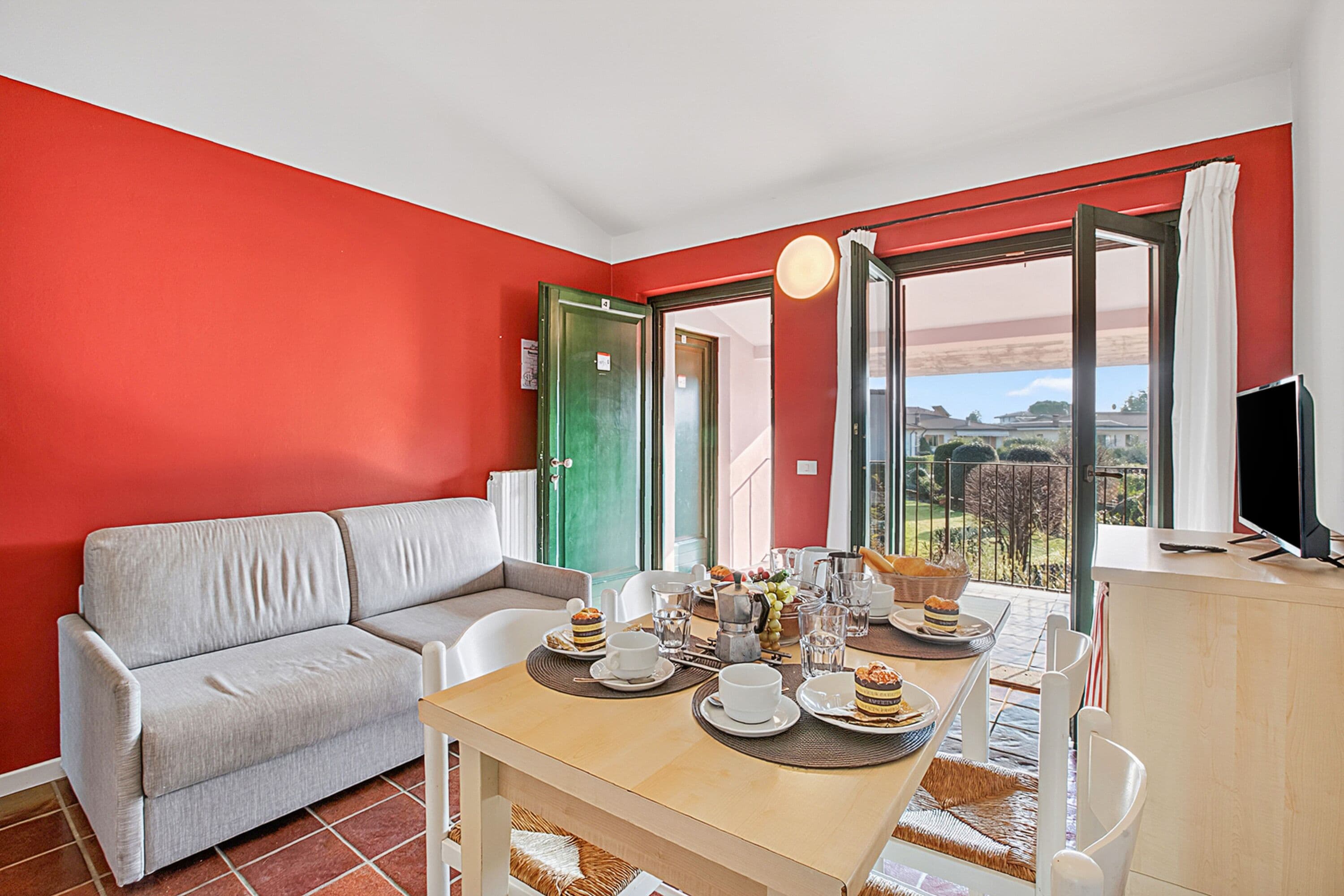 Family Apartment, Multiple Bedrooms, 2 Bathrooms (Cosy House Serena- park & shared pool) | Living area | 21-inch flat-screen TV with cable channels