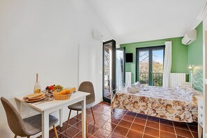 Family Apartment, Multiple Bedrooms, 2 Bathrooms (Cosy House Serena- park & shared pool) | Dining - Cosy House Serena- Park & Shared Pool (Puegnago del Garda)