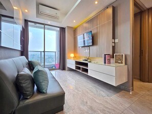 Apartemen, 2 kamar tidur, pemandangan kota | Area keluarga | Smart TV 43-inci dengan saluran TV kabel