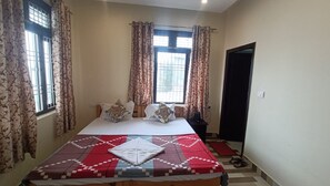 Deluxe Double Room, Hill View | Desk, free WiFi, bed sheets - Manaskhand Homestay Ranikhet near NH109 (Ranikhet)
