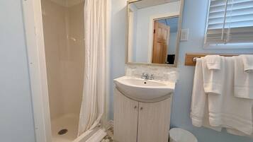 Suite, 2 Queen Beds | Bathroom | Towels, soap, shampoo, toilet paper