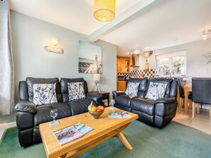 Living area - Superb sea views from a ground floor apartment, set in tranquil grounds. (Seaton)