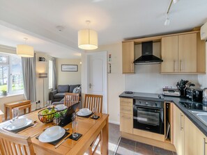 Private kitchen - Superb sea views from a ground floor apartment, set in tranquil grounds. (Seaton)