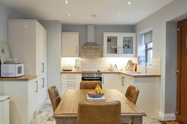 Well-equipped fitted kitchen with dining area | The Corn Store - Millmoor Farm, Bickley, near Malpas