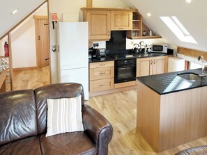 Open plan styled living/ kitchen | Corn Keep - Wooldown Holiday Cottages, Marhamchurch, near Bude - 1 bedroom accommodation in Marhamchurch, near Bude (Marhamchurch, near Bude)
