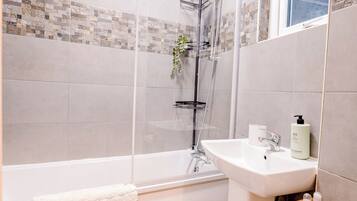 Eco-friendly toiletries, hair dryer, towels, soap
