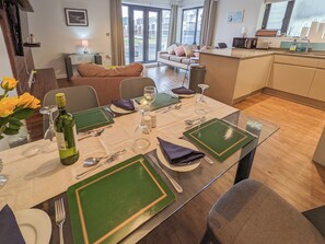 TV - Folly View is a first floor apartment that sleeps 4 guests in two bedrooms. (Newport)