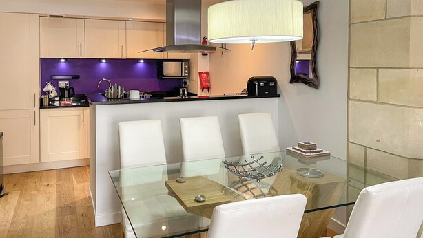 A modern kitchen with a dining area. - Abbey Church 14 - UKC5423 (Fort Augustus)